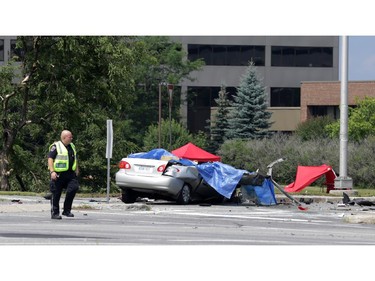 Two are dead and police are investigating after two cars collided at the intersection of March Rd. and Carling Ave. in Kanata (Ottawa), Sunday, July 27, 2014. Two others are in hospital with life-threatening injuries.