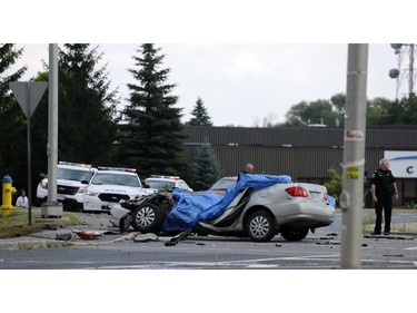 Two are dead and police are investigating after two cars collided at the intersection of March Rd. and Carling Ave. in Kanata (Ottawa), Sunday, July 27, 2014. Two others are in hospital with life-threatening injuries.