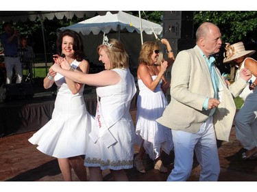U.S. Ambassador Bruce Heyman and his wife, Vicki (left), really grooved on the dancefloor at the embassy's annual Independence Day party held at their official residence in Rockcliffe on Friday, July 4, 2014.