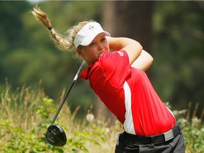 PINEHURST, NC - JUNE 22:  Amateur Brooke Henderson of Canada hits her tee shot on the 11th hole during the final round of the 69th U.S. Women's Open at Pinehurst Resort & Country Club, Course No. 2 on June 22, 2014 in Pinehurst, North Carolina.