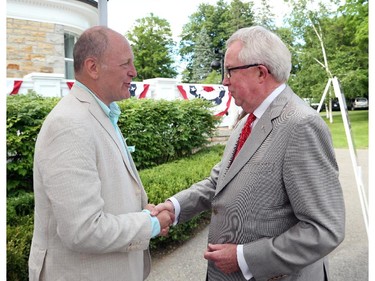 United States Ambassador Bruce Heyman (L) greets Joe Clark during the annual Fourth of July Independence Day celebration at US Ambassador's residence in Ottawa, July 04, 2014.