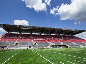 Workers put the final touches on TD Place Stadium at Lansdowne Park.
