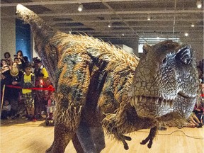 Canadian Museum of Nature hosted a preview of Walking With Dinosaurs Aug 13 where crowds of children viewed the seven foot tall 14 foot long baby T-Rex.