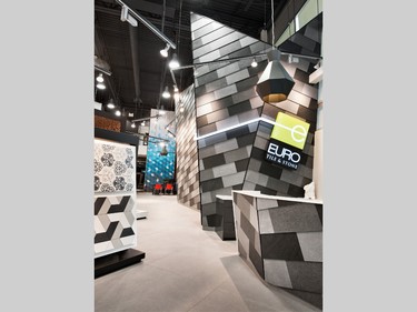 Affectionately called the Pope’s hat, the angled walls that hide a sample storage room add a funky vibe. Clad in overlapping slate tiles mimicking shingles, it's one more example of how the showroom encourages visitors to think outside the box when it comes to tile.
