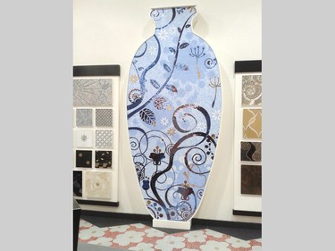 While a giant mosaic tile vase may not be for every home, the idea that you can use tile for more than backsplashes and floors is one of the ideas Euro Tile & Stone is trying to get across in its new showroom. This mural in Sicis tile (a high-end Italian glass tile) combines various materials including gold foil to create a piece of art worth about $30,000.