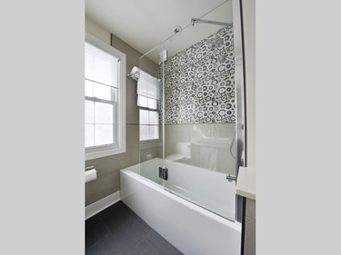 New mosaic patterned tiles are great for eclectic or modern spaces, says Steve Barkhouse of Amsted Design/Build. They achieve the look of a mosaic, without the requirement of small tiles being laid individually. As an example, he offers this recent bathroom renovation using Olympia Tile & Stone’s Bubbles sheet mosaic.
