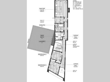 Second level floor plan of 317 Riverdale. The master suite takes up the back half of the home, along with the main bathroom, which includes a sectioned off laundry area.