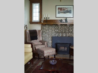 Preserved wood trim, beamed ceilings, original light fixtures and refurbished antiques and rugs help visitors imagine how it would have appeared when this home was built in 1917.