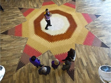 Euro Tile & Stone created a 30-foot wide tile sunburst on the floor of the Wabano Centre for Aboriginal Health, as shown in this Jan. 27, 2014 photo.