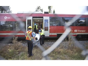 One person was slightly injured when OC Transpo's O Train had a slight derailment at Carleton University Aug 11.  (Pat McGrath / Ottawa Citizen)