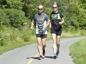 Una Beaudry and Steve Mahood on the Rockcliffe Parkway, are a married couple that run together every day.