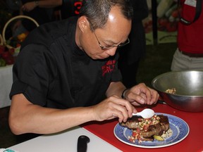 Ottawa chef John Leung of Steak Modern: Steak & Sushi at the Upper Canada Village Iron Pan Competition, photo by Susan Le Clair