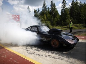 Rob Graveline does a burnout in his 1970 Opel at the Capital City Dragway in Stittsville.