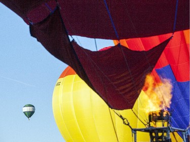 A hot air balloon launches.