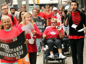 About 20 ACORN members protested up Metcalfe Street from the downtown Ottawa Public Library Thursday afternoon. The group wants the federal government and the CRTC to lower broadband prices for low income families so kids can do homework at home.