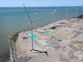 Windmills rise over Lake Erie in Lackawanna, New York, near the U.S.-Canada border. Ontario once wanted to be a world leader in building windmills not just on land, but well out in the Great Lakes.