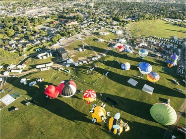 An aerial photograph taken from a hot air balloon shows balloons preparing to launch in Gatineau Friday, August 29, 2014.