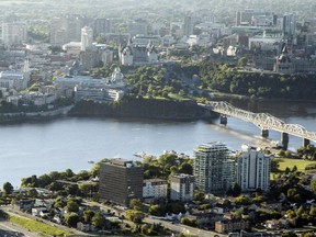 An aerial photograph taken from a hot air balloon shows downtown Ottawa and the Alexandra Bridge in Gatineau Friday, August 29, 2014.