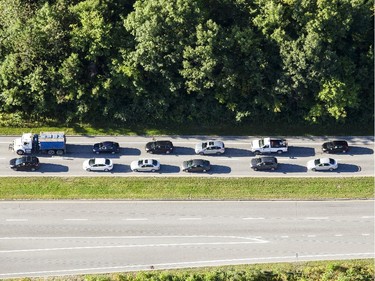 An aerial photograph taken from a hot air balloon shows traffic along Des Allumetieres Blvd. in Gatineau Friday, August 29, 2014.