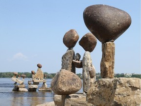 An international rock balancing art festival was held on the Ottawa River, August 4, 2014.