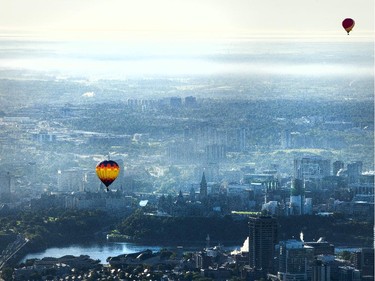 Balloons float over Ottawa Friday, August 29, 2014.