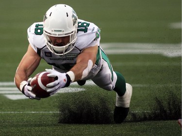 Brett Swain of the Saskatchewan Roughriders scores a Touchdown during the first half of CFL game action against the Ottawa Redblacks at TD Place in Ottawa on Saturday, Aug. 2, 2014.