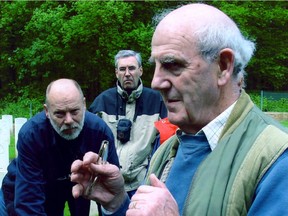 British military historian and author Martin Middlebrook speaks on a tour of a cemetery where war dead from the Somme are buried.