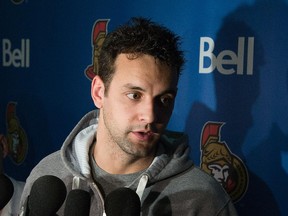 Clarke MacArthur talks the media as the Ottawa Senators held their exit meetings with coaches at Canadian Tire Centre in Ottawa following the end of their season. Photo taken on April 14, 2014.
