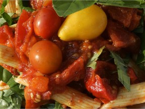 Cherry tomatoes, garlic, olive oil and fresh basil make an easy and flavourful late-summer pasta sauce.