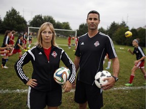 Dina Bell-Laroche and Mike Thornley coach the West Ottawa Soccer Club U-15 L-4 competitive girls team. Bell-Laroche, a mother of three children who play competitive soccer, said parents and coaches need to get to the point where they all understand how to prevent head injury and what to do if it happens.
