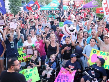 Fans gather on the plaza during a family friendly event featuring TSN announcers during the Ottawa Redblacks and Calgary Stampeders match at TD Place in Ottawa on August 24, 2014.