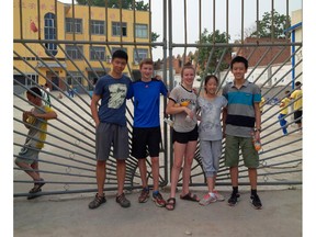 A group of Ottawa students has been volunteering at an orphanage in China. From left: Hongyi Wan 16 ,-Ashbury College;- Spencer Griffin, 15-, Ashbury College;  Charly Griffin, 13, -Ashbury College;  Melanie Li, 12 , Lycee Claudel; and, Anthony Li, 15, -Ashbury College.