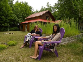 Jackie King, left, and her daughter Caitlin spend long, lazy summer weekends at the woman cave in the woods.