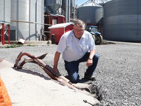 After the soybean roasting room on Gary Derks's farm burned to the ground, he received a hydro bill for $1,214 for power he never used.