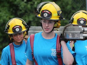 Girls aged 15 - 19 spend a week training in some of the duties of an Ottawa firefighter while participating in Camp FFIT (Female Firefighters in Training). Assignment #117953 Photo taken at 13:11 on August 12, 2014. (Wayne Cuddington/Ottawa Citizen)