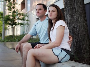 Isabelle Lamoureux sits with her husband Adam Lamoureux. Isabelle was hit and injured by a cyclist on Sunday morning during a run in Ottawa.