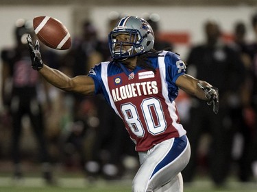 Montreal Alouettes wide receiver James Rodgers catches a bouncing ball on a punt return by the Ottawa Redbalcks during second quarter CFL football action Friday, August 29, 2014 in Montreal.