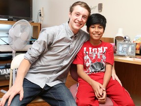 Jess Haw (L) saved 12 year old Laurence Peralta. (Jean Levac / Ottawa Citizen)   ORG XMIT: 0826-drowning