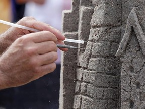 'Pore water pressure' is the secret that makes a sand castle stand up, scientists say.