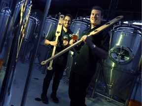 Josh McJannett (left) is the Brewer and Alex Monk is the CFO of the new Dominion City Brewing Company.  Photographed at their micro-brewery in Ottawa on Tuesday, Aug. 12, 2014.