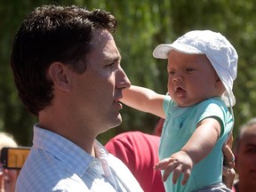 Liberal Leader Justin Trudeau with his son, Hadrien, at a Vancouver event this month. Police are investigating an apparent break-in at the Trudeau home in Rockcliffe Park.