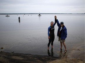 Lesley Dusevic, left, a swimming coach from Ottawa, finished her swim ahead of everyone in less than an hour.