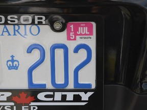 License plate sticker that expires on July, 2015. (James Park / Ottawa Citizen)