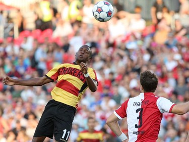 Mason Trafford #3 of the Ottawa Fury defends against a header by Fafà  Picault #11 of the Fort Lauderdale Strikers during an NASL match at TD Place in Ottawa on August 9, 2014.
