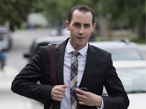 Former Conservative party staffer Michael Sona leaves court in Guelph, Ont. on Thursday, August 14, 2014. Sona was found guilty of trying to prevent voters from voting during the 2011 federal election.
