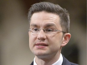 Pierre Poilievre speaks during question period in the House of Commons on Thursday May 1, 2014 .
