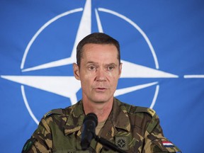 Dutch Brig.-Gen. Nico Tak, Director of the Comprehensive Crisis and Operations Management Centre at SHAPE  (Supreme Headquarters Allied Powers Europe) speaks to the media in Mons, Belgium on Thursday.