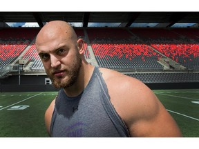 Offensive lineman #65 Nate Menkin hopes to make a start on Friday night as the Ottawa Redblacks practice at TD Place on Wednesday morning. Assignment #117957 Photo taken at 12:18 on August 13, 2014. (Wayne Cuddington/Ottawa Citizen)