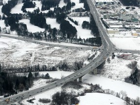 Aerial photo of the Hunt Club bridge (also known as the Michael J.E. Sheflin Bridge). A portion of Riverside Drive and the Ottawa Hunt Golf Club can also be seen.
