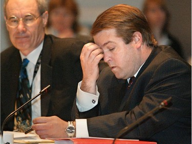 Councillor Peter Hume, right, with Clive Doucet looking on, looked tired even at lunchtime on March 24, 2004 with many more hours to go as the council moved at a snail's pace during the 2004 budget deliberations.